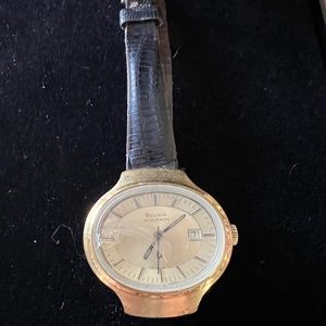 Women’s Bulova watch with brown leather band